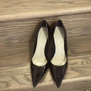 Nine West beautiful in good condition black high heels .